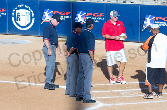 Coaches/Umpires meeting at home plate